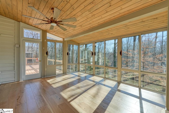 unfurnished sunroom with lofted ceiling, wooden ceiling, and ceiling fan