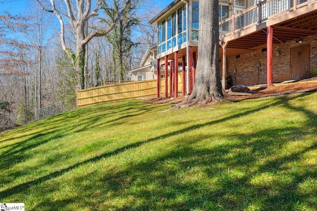 view of yard with a wooden deck