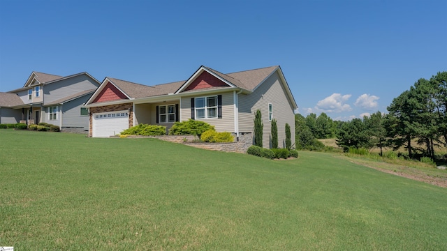 view of front facade with a garage and a front lawn