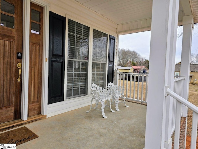 balcony featuring covered porch