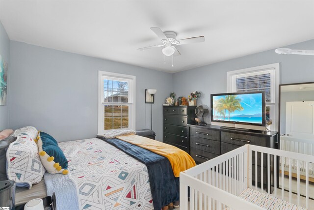 bedroom featuring ceiling fan