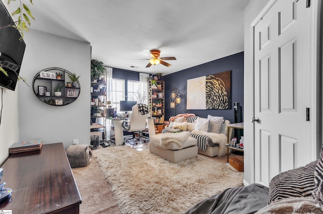 living room with ceiling fan