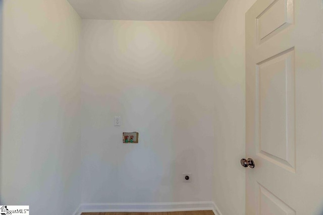washroom with hookup for a washing machine and electric dryer hookup