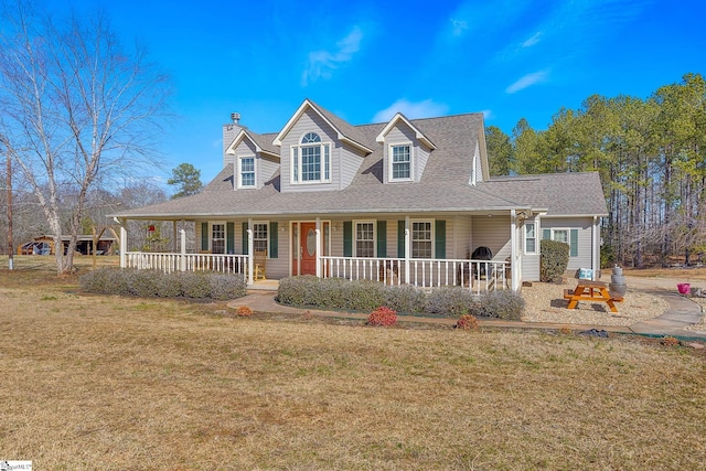 view of front of home with a front lawn and a porch