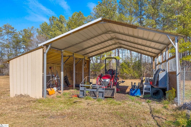 view of outbuilding with a carport