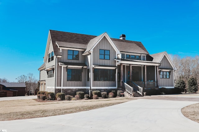 view of front of property featuring a sunroom