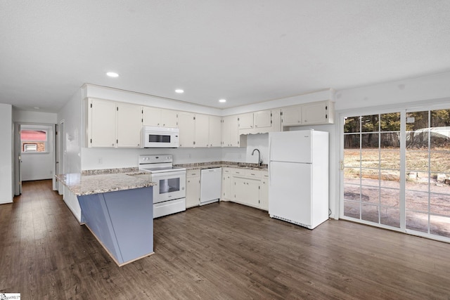 kitchen with white cabinetry, white appliances, sink, and dark wood-type flooring