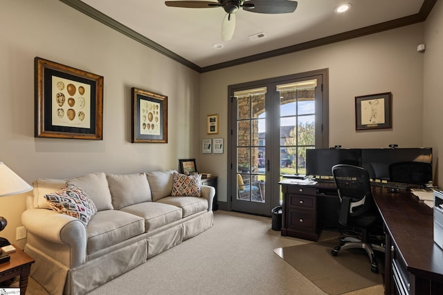 office area with crown molding, light colored carpet, and ceiling fan