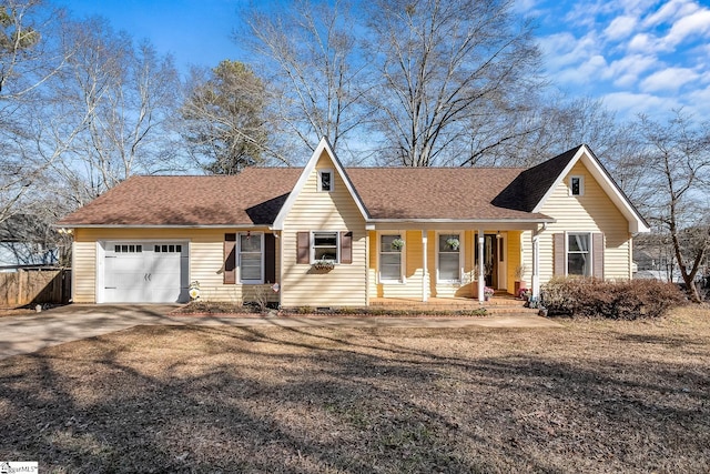 view of front facade featuring a garage and covered porch