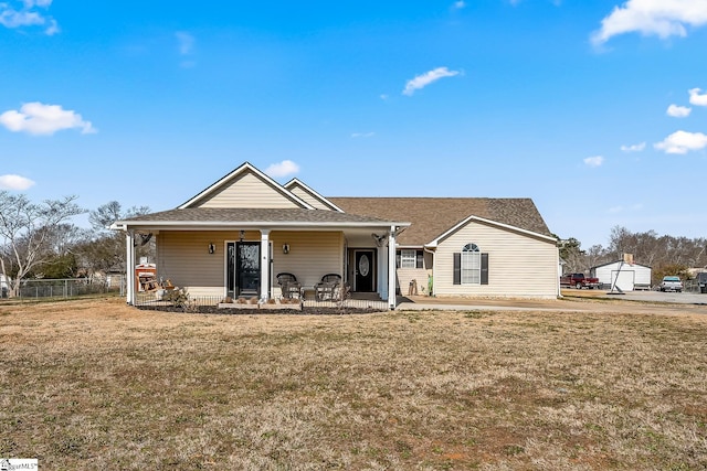 view of front facade with a porch and a front lawn