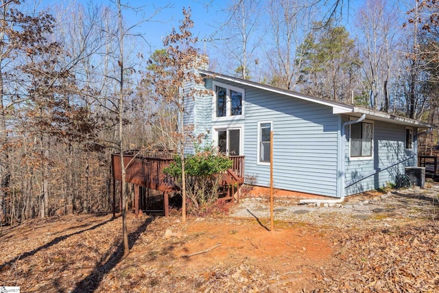 rear view of property with a deck