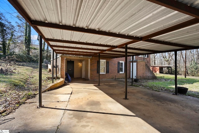 view of patio / terrace featuring a carport