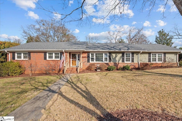 ranch-style home with a front yard