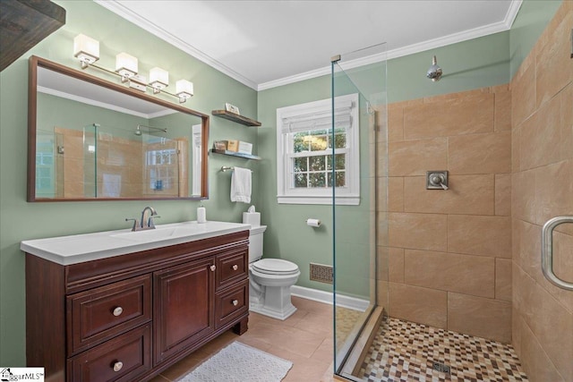 bathroom with tile patterned floors, toilet, a shower with shower door, ornamental molding, and vanity