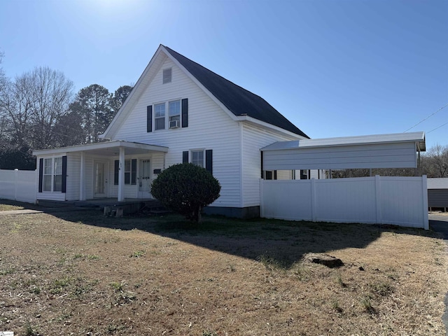 exterior space featuring a yard and covered porch