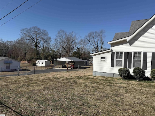 view of yard featuring a carport