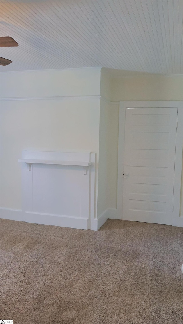 unfurnished living room featuring carpet flooring