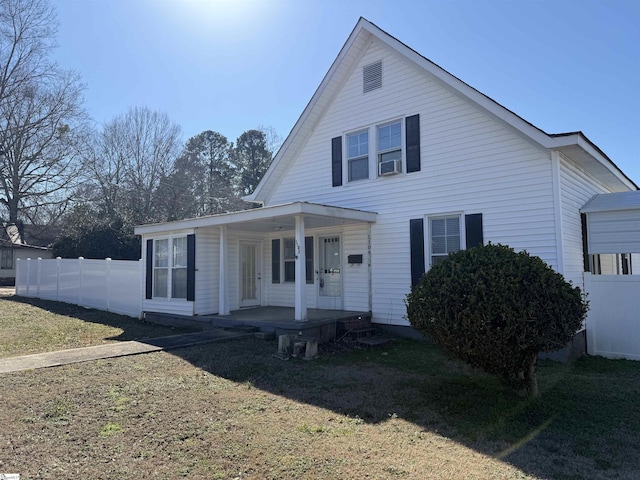 view of front facade with a porch and a front lawn