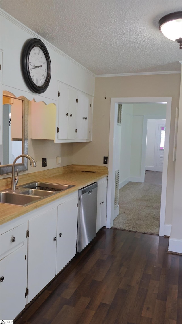 kitchen with sink, dishwasher, dark hardwood / wood-style floors, ornamental molding, and white cabinets