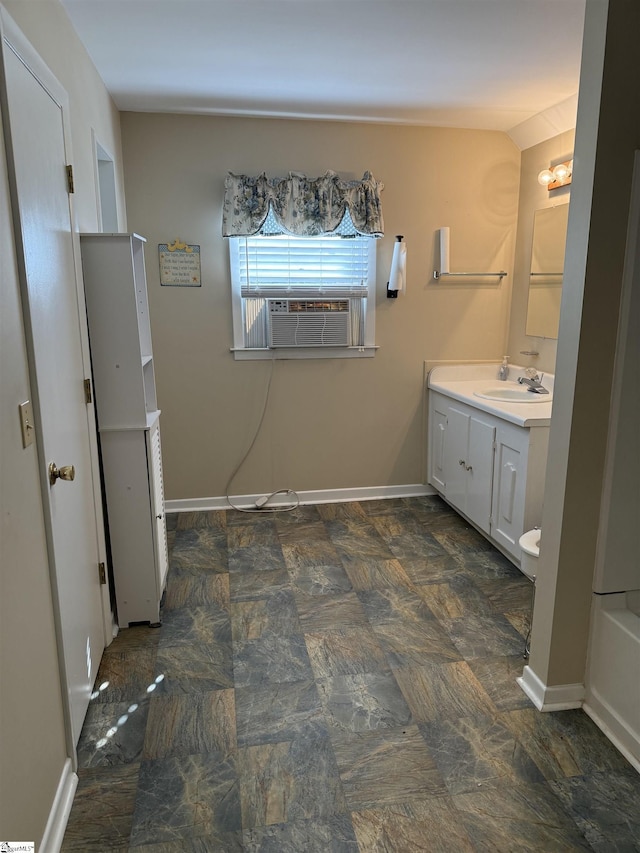 bathroom featuring vanity and a bathtub