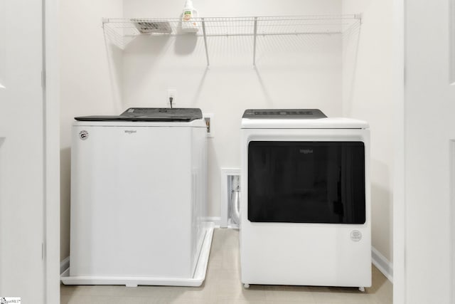 laundry area with washer and dryer