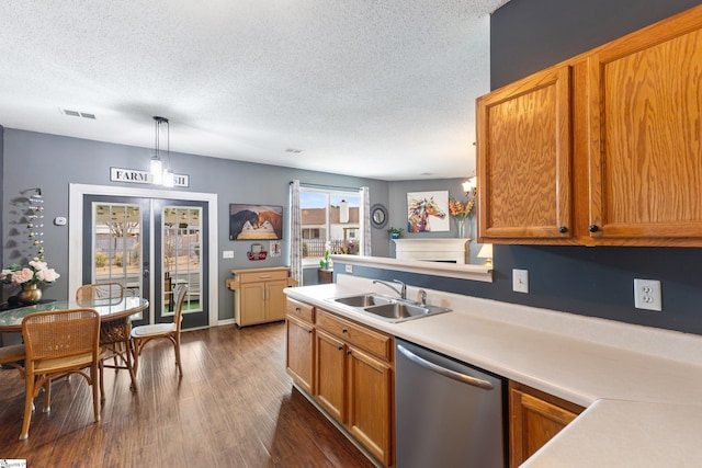 kitchen with sink, dishwasher, dark hardwood / wood-style floors, decorative light fixtures, and french doors