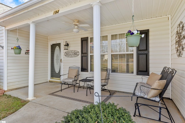 view of patio / terrace with ceiling fan and a porch