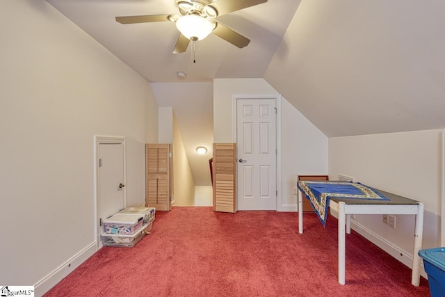 recreation room with lofted ceiling, carpet, and ceiling fan