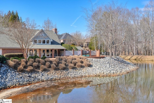 exterior space featuring a water view