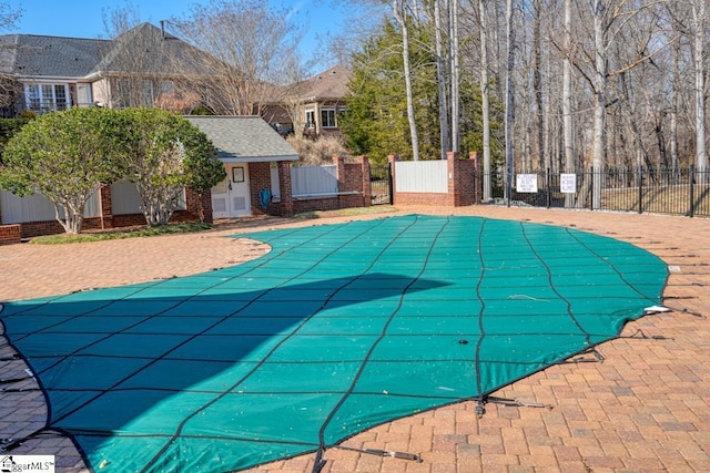 view of swimming pool with a patio area