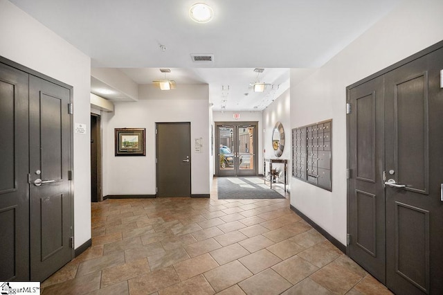 entryway with mail boxes