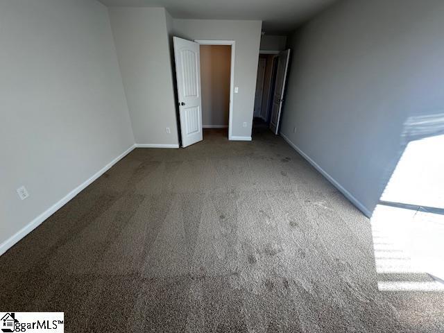 unfurnished bedroom featuring carpet floors