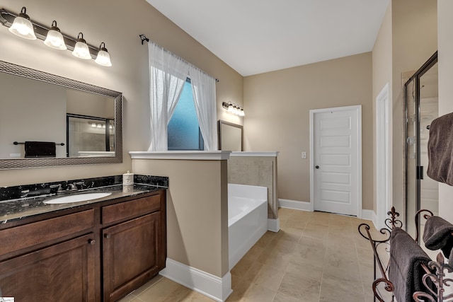 bathroom featuring vanity and a washtub