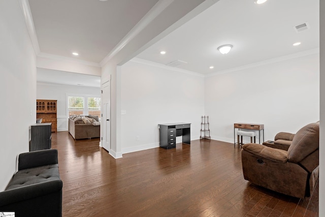 sitting room featuring crown molding and dark wood-type flooring