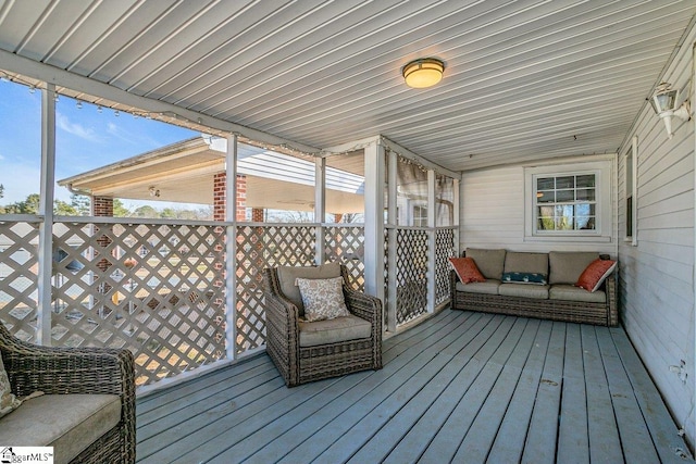 wooden deck featuring an outdoor hangout area