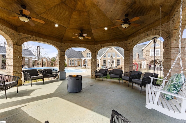 view of patio / terrace with ceiling fan and an outdoor hangout area