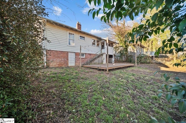 view of yard featuring a wooden deck