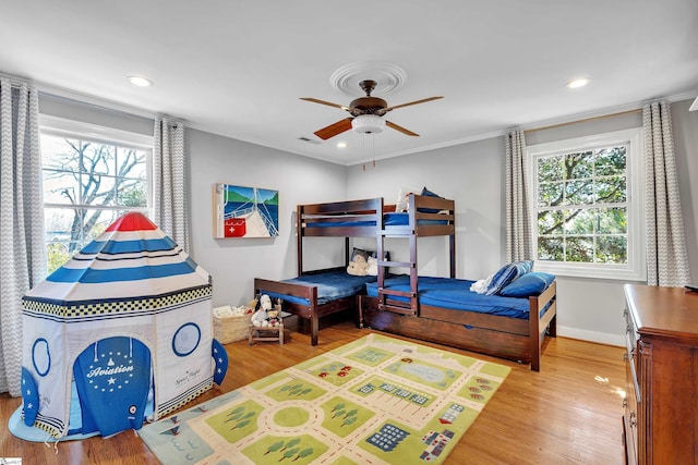 12 Cothran St, Greenville, SC 29605 - bedroom featuring hardwood / wood-style flooring, ornamental molding, and ceiling fan