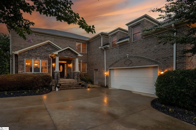 view of front of property featuring a garage