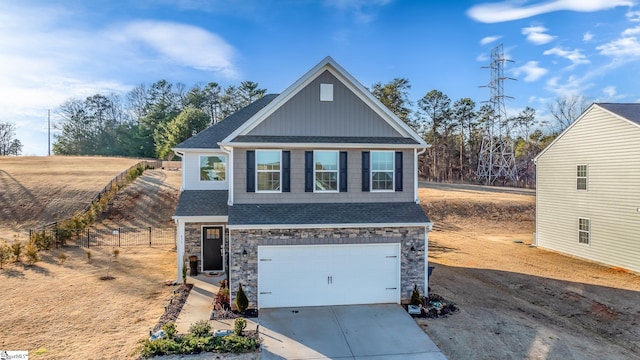 view of front of property with a garage