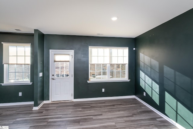 entrance foyer with hardwood / wood-style floors