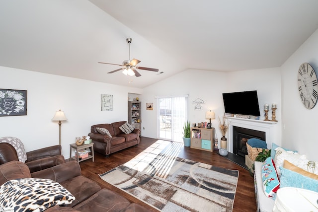 living room featuring lofted ceiling, dark hardwood / wood-style floors, and ceiling fan