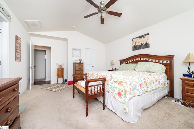 carpeted bedroom with lofted ceiling and ceiling fan