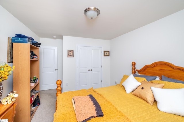 carpeted bedroom featuring a closet