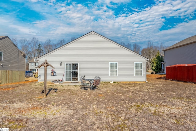 back of property featuring a patio area