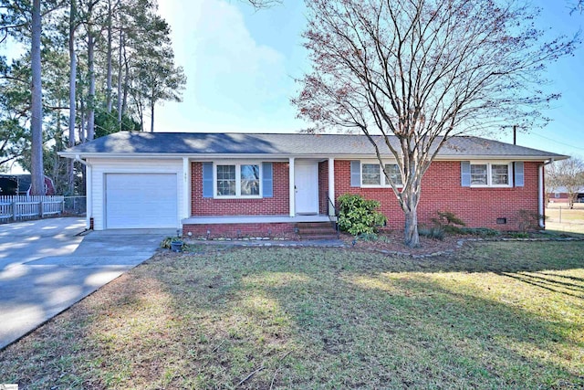 ranch-style house featuring a garage, brick siding, concrete driveway, crawl space, and a front yard