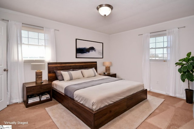 bedroom with baseboards, ornamental molding, and light colored carpet