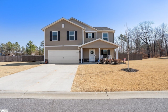 view of front facade with a garage and a porch