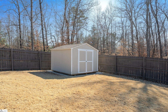 view of outbuilding with a yard