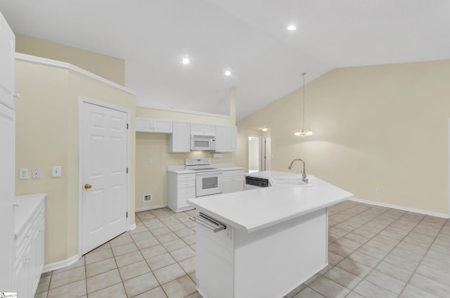 kitchen featuring pendant lighting, sink, white appliances, lofted ceiling, and white cabinets